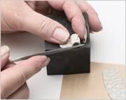 Filing with a needle file